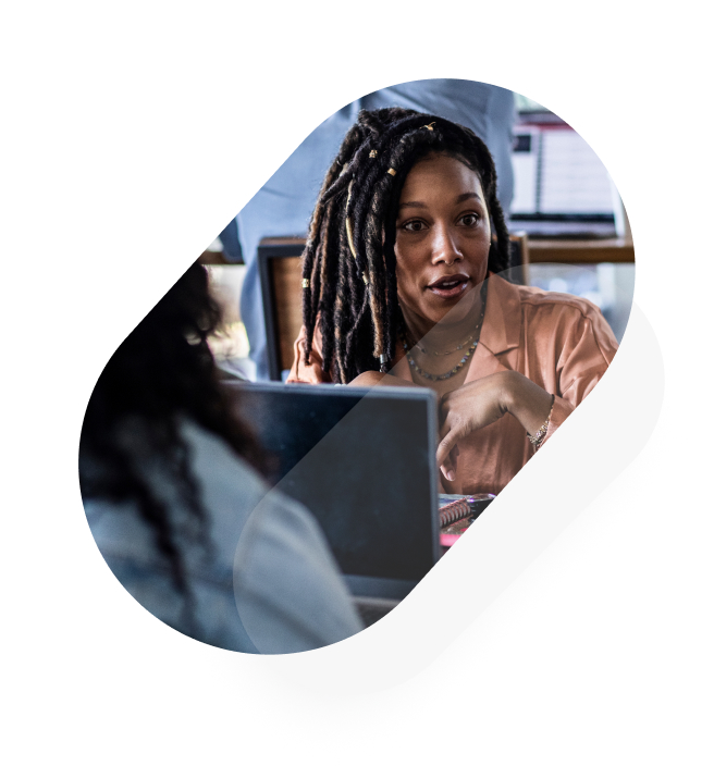 Young professional woman at work on computer
